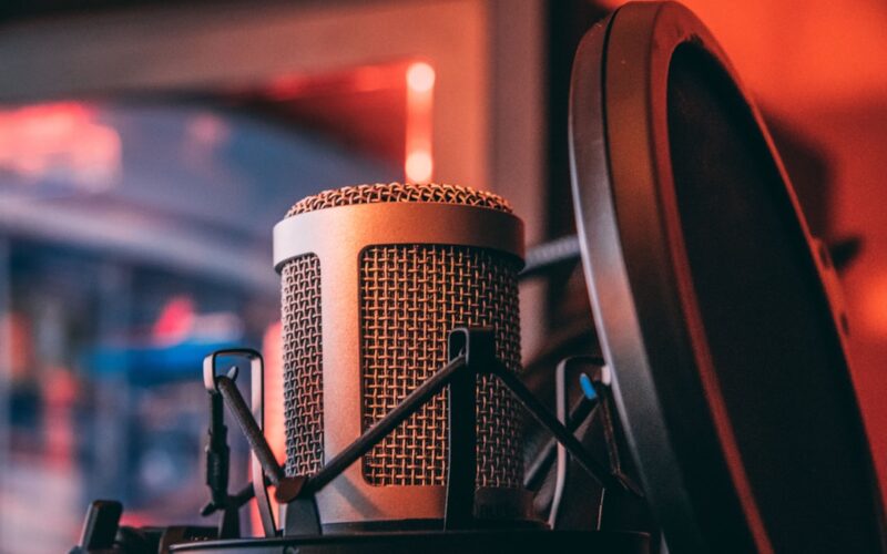 gray microphone beside of condenser